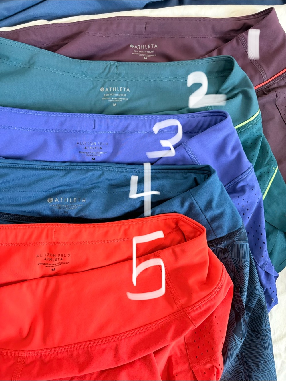 Athleta women’s “run with it” short size medium lots of colors